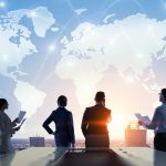 Silhouettes of business people working in cooperation. Mixed media, international business